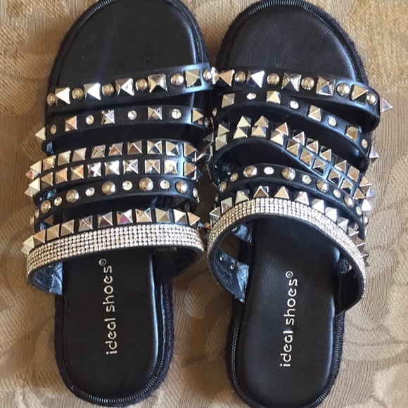 black slides with studs